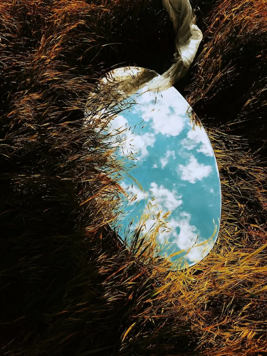 a mirror reflecting the blue sky