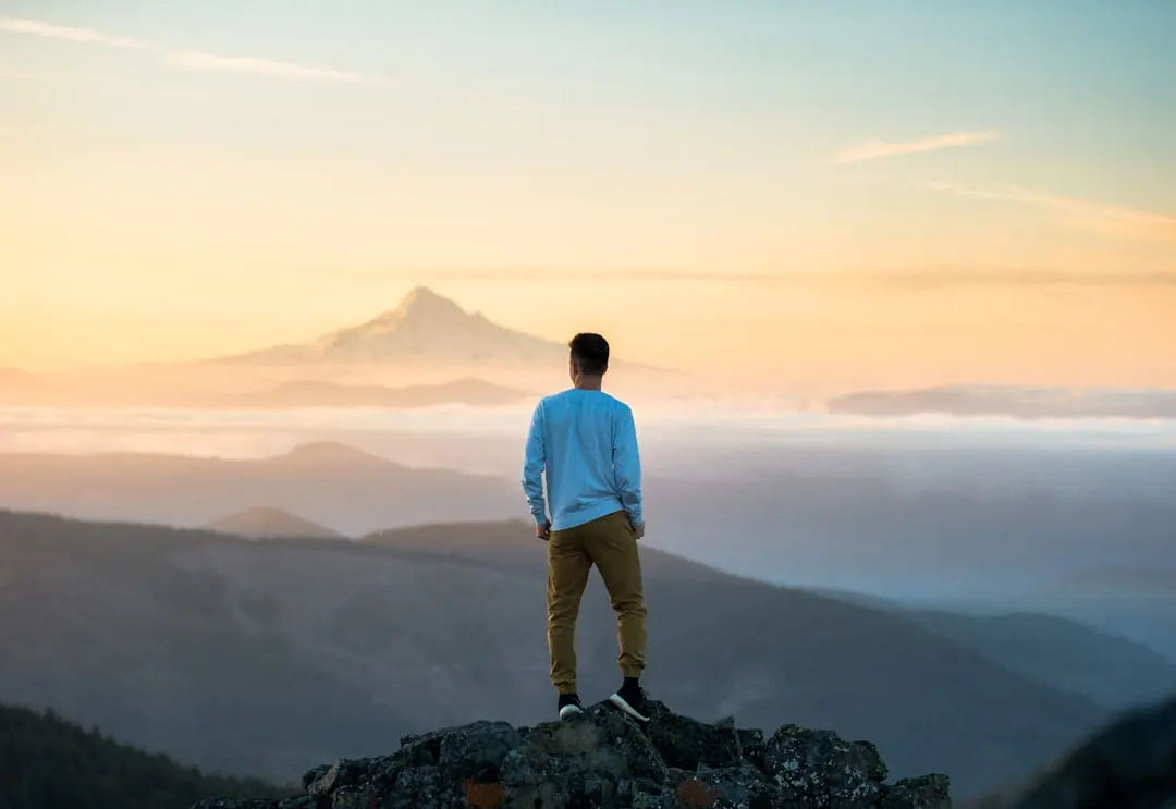 Person meditating in nature